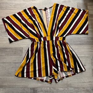 Black/yellow/red Windsor romper.